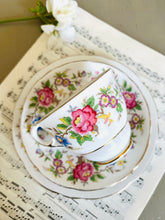 Load image into Gallery viewer, Pretty vintage floral teacup trio made by Rochester china England
