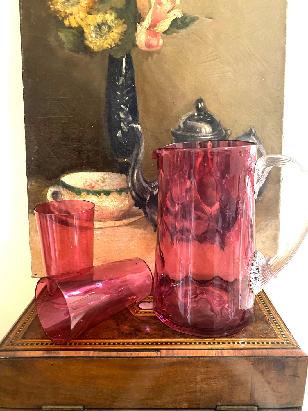 Original antique English cranberry glass jug with two matching glasses