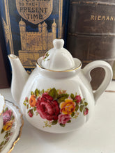 Load image into Gallery viewer, Miniature vintage teapot and teacup and saucer set (2 pieces)
