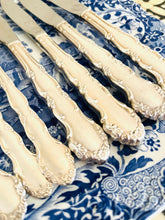 Load image into Gallery viewer, Set of 4 silver plated knives and forks with ornate handles

