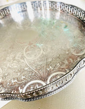 Load image into Gallery viewer, Large silver plate on copper engraved vintage tray with galleried sides and claw feet. Made in England
