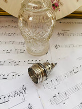 Load image into Gallery viewer, Vintage cut glass bottle with silver plated top
