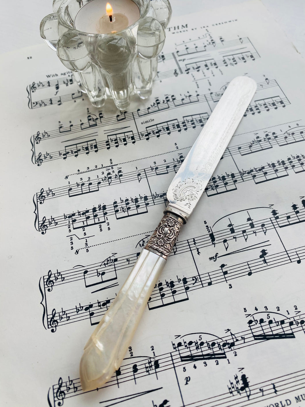 Antique engraved silver plated butter knife with mother of pearl handle