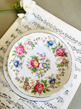 Load image into Gallery viewer, Pretty vintage floral teacup trio made by Rochester china England
