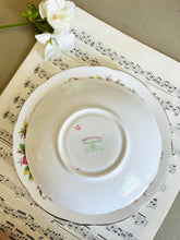 Load image into Gallery viewer, Pretty vintage floral teacup trio made by Rochester china England
