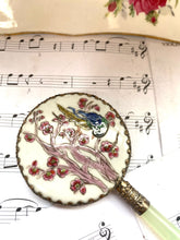 Load image into Gallery viewer, Vintage hand mirror with enamelled back
