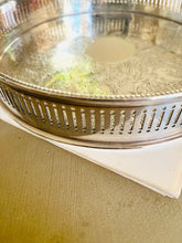 Load image into Gallery viewer, Small vintage oval silver plated engraved tray 21cm by 16cm. Made in England
