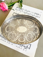 Load image into Gallery viewer, Small vintage oval silver plated engraved tray 21cm by 16cm. Made in England
