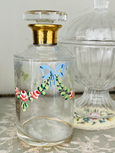 Load image into Gallery viewer, Vintage French cologne bottle with hand painted ribbons and roses
