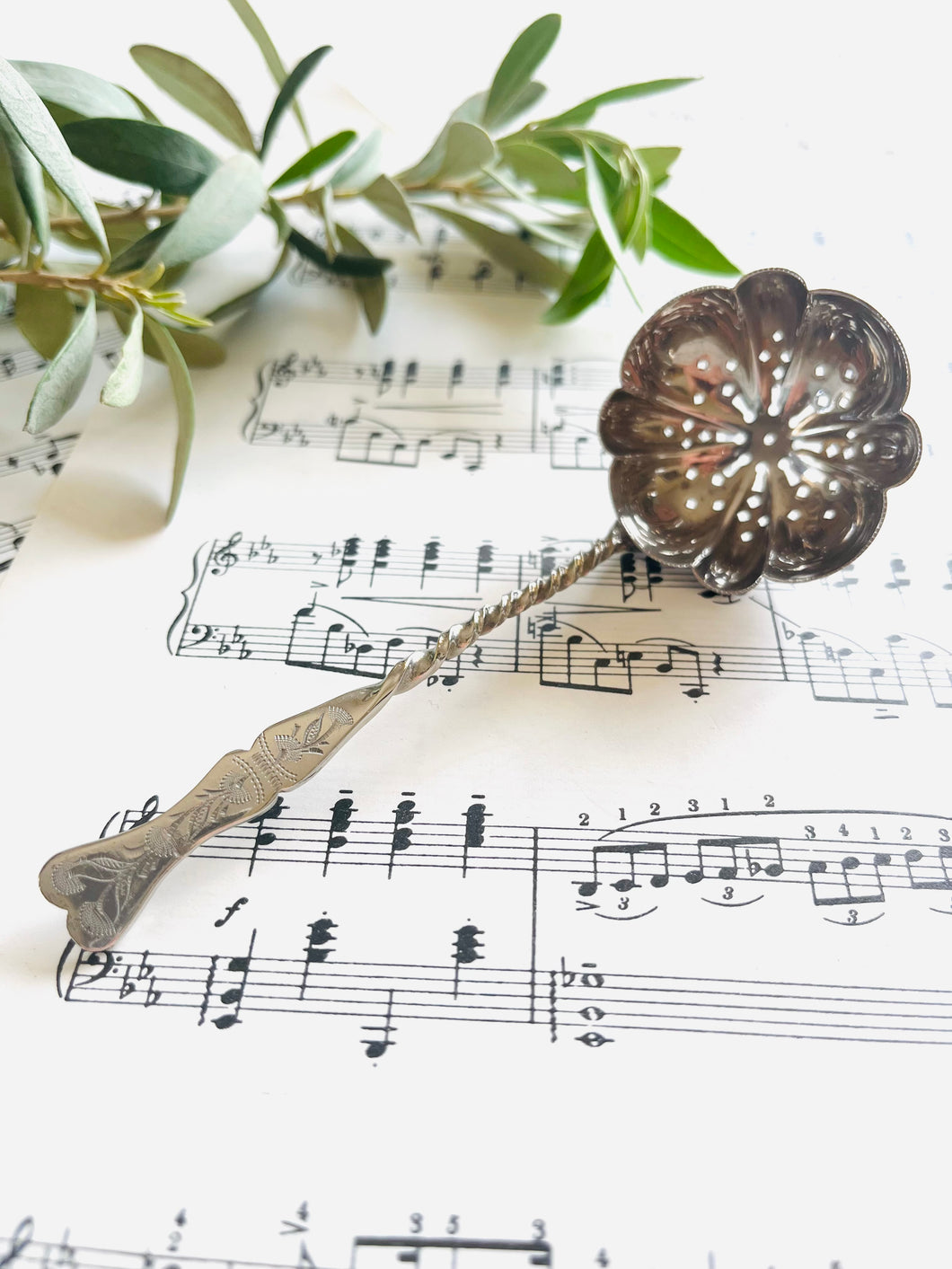 Pretty English silver plated sugar sifter or tea strainer