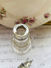 Load image into Gallery viewer, Vintage cut glass bottle with silver plated top
