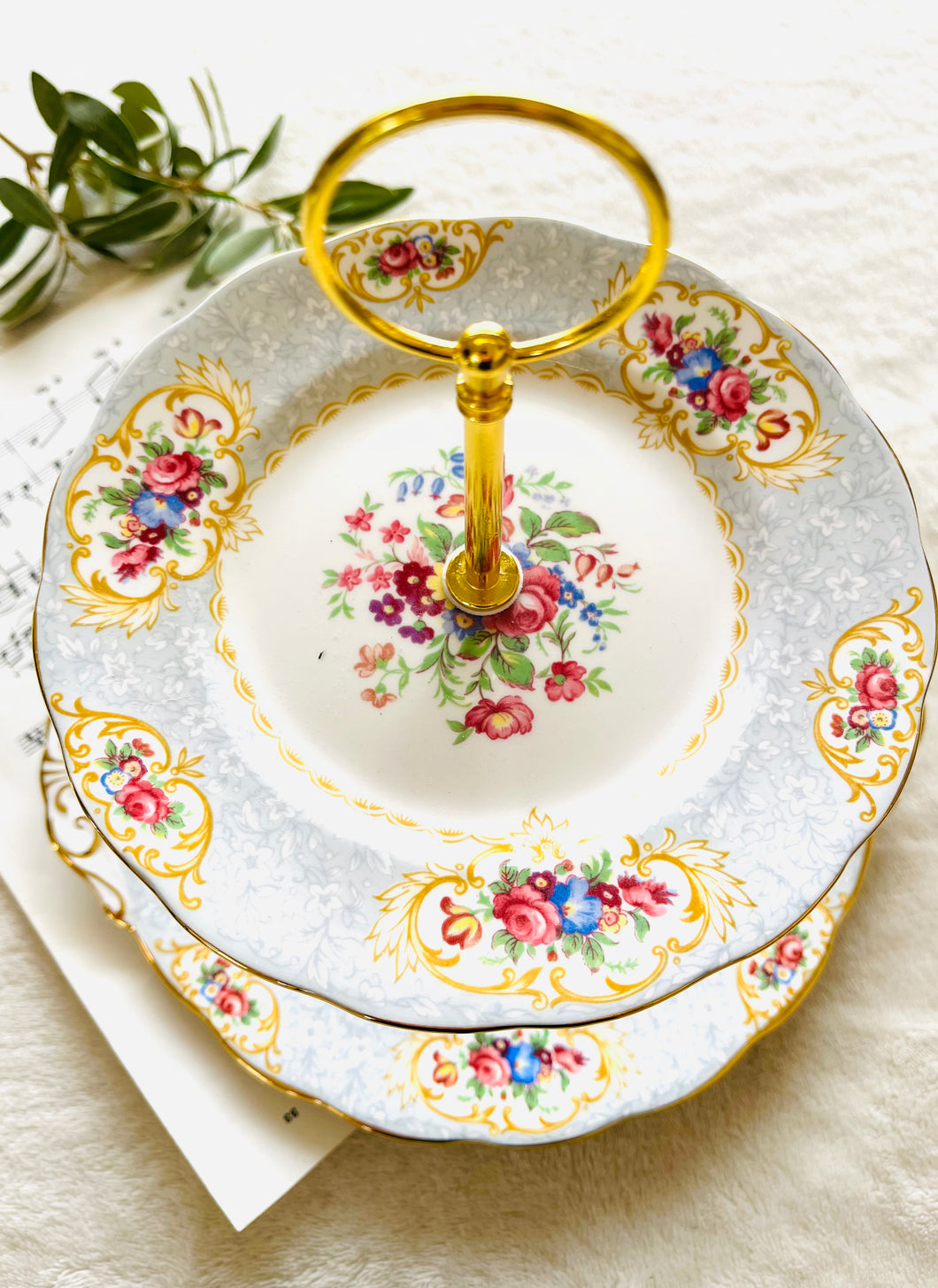 Two tier cake stand made with original vintage plates