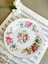 Load image into Gallery viewer, Pretty vintage floral teacup trio made by Rochester china England
