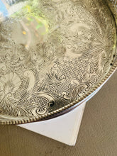 Load image into Gallery viewer, Small engraved circular silver plated tray 21cm across. Made in England
