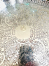 Load image into Gallery viewer, Large silver plate on copper engraved vintage tray with galleried sides and claw feet. Made in England
