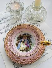 Load image into Gallery viewer, Beautiful pink vintage teacup and saucer set with 22k Gold trim
