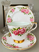 Load image into Gallery viewer, Paragon china teacup trio, pink roses with pale green cup inner

