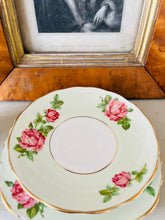 Load image into Gallery viewer, Colclough china 1940s pale green with pink cabbage roses teacup trio
