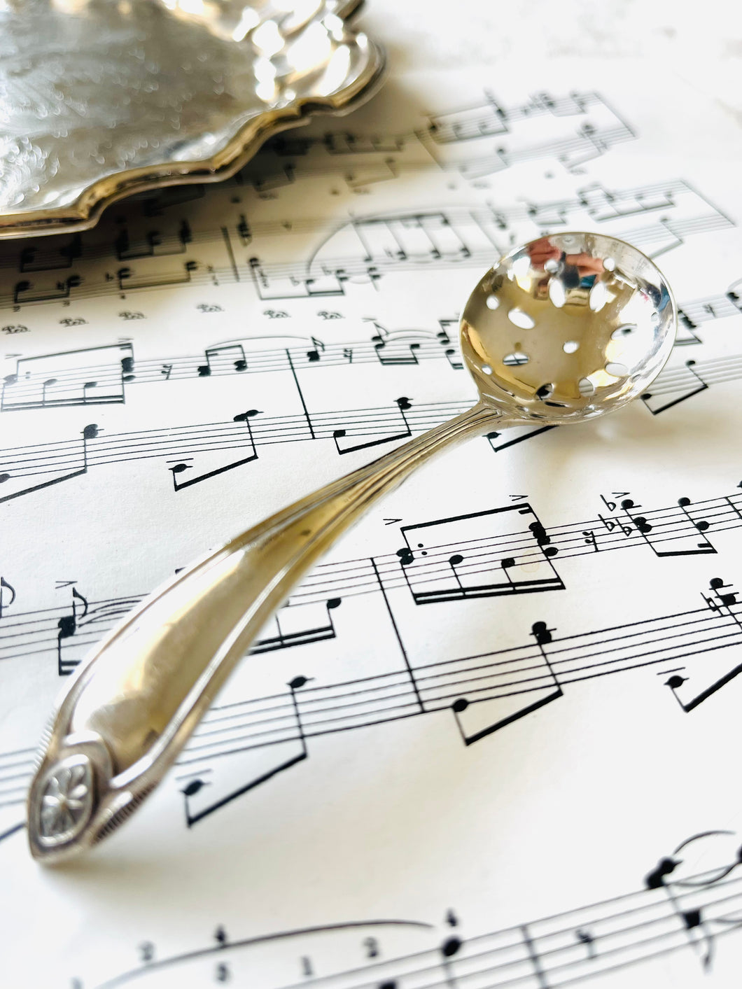 Vintage silver plated tea strainer